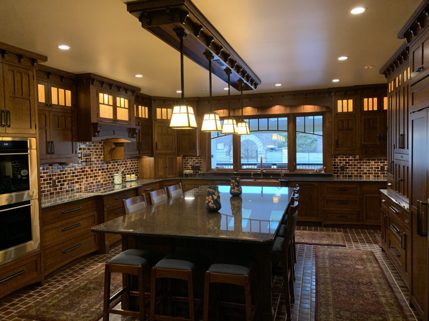 A kitchen with a huge dining table